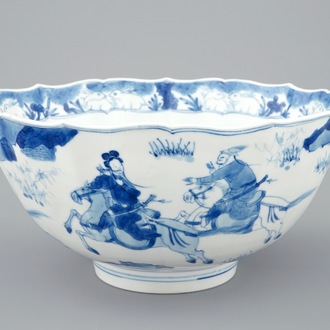 Un bol en porcelaine de Chine bleu et blanc à décor de cavaliers, Kangxi